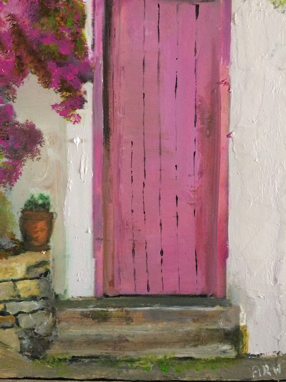 Mediterranean House with Pink Flowers