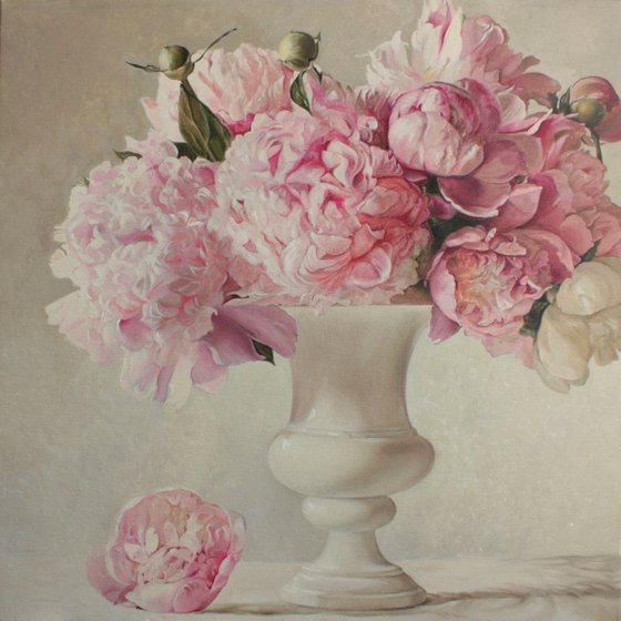 Bouquet of peonies in a white vase