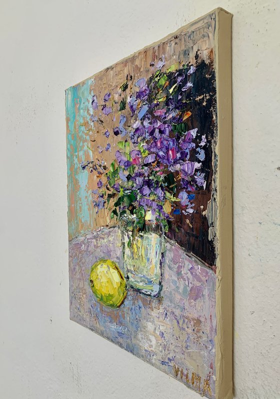 Still life with flowers and lemon
