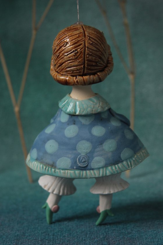 Little Girl in tender blue dress. Hanging sculpture, bell doll by Elya Yalonetski