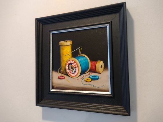 Vintage Cotton reels with buttons still life