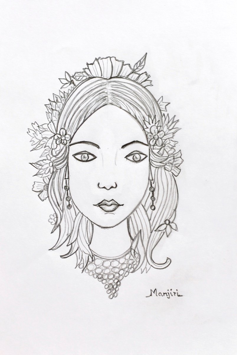 Pretty face drawing on paper by Manjiri Kanvinde