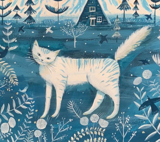White cat in a blue winter