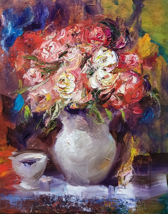 Bouquet of roses and cup