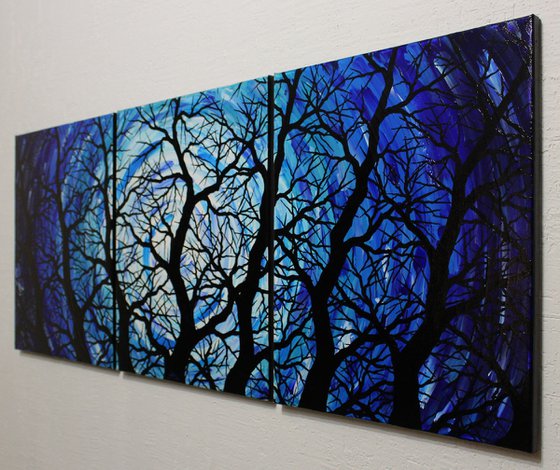 Triptych silhouettes of night trees