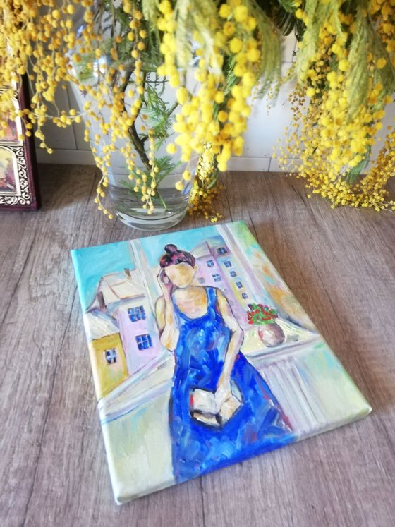 Faceless Woman Reading