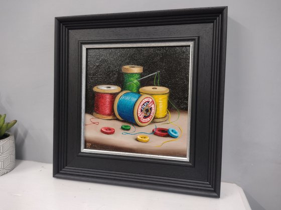 Vintage Cotton reels with buttons still life