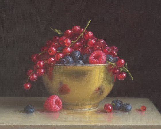 Berries in a golden bowl