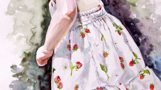Little girl picking flowers
