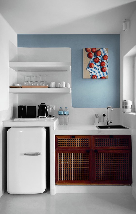 Red apples on a kitchen towel