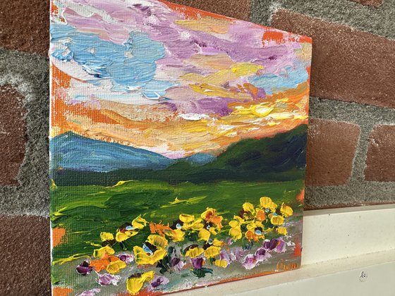 Orange sunset with flowers