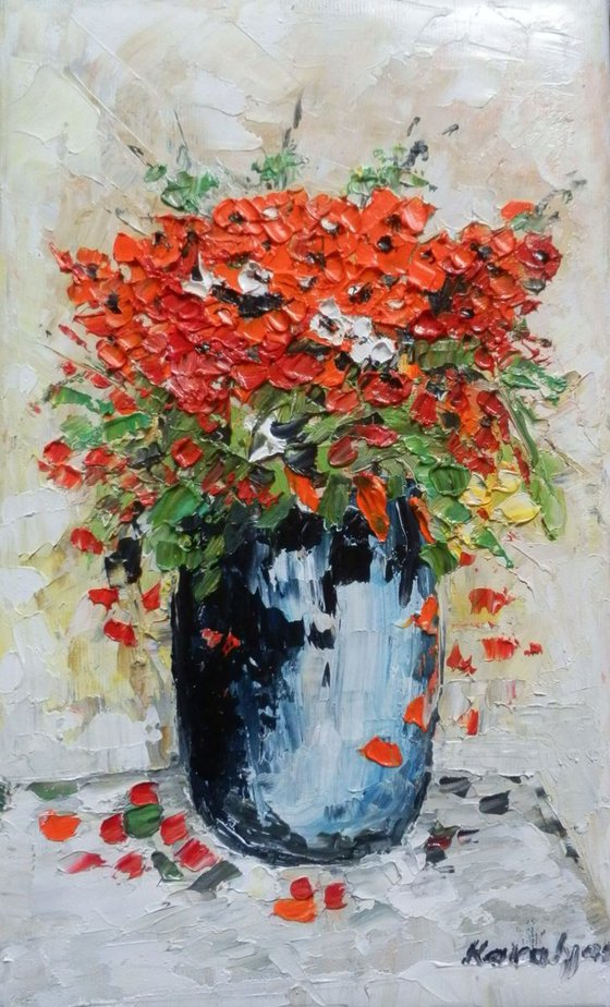Red flowers in a bowl