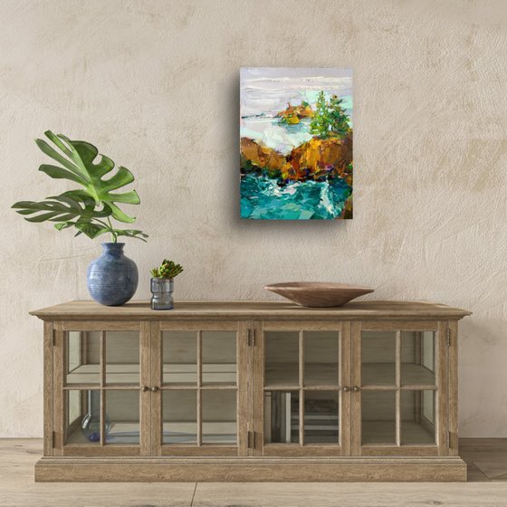 AT THE EDGE OF THE SEA