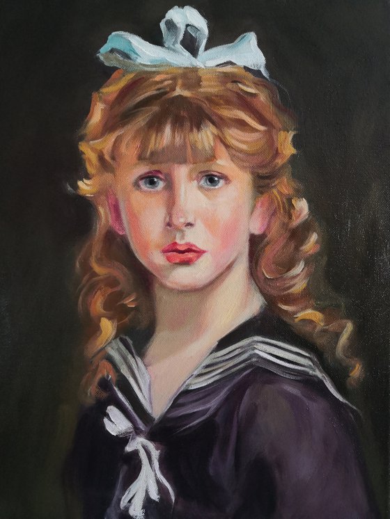 Portrait of a little girl with bow in her hair