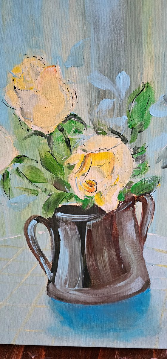 Blooming yellow roses on blue