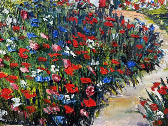 Old house with red flowers