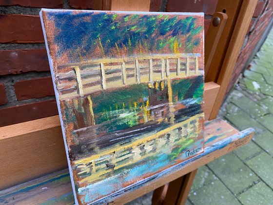 Small wooden bridge. Pleinair