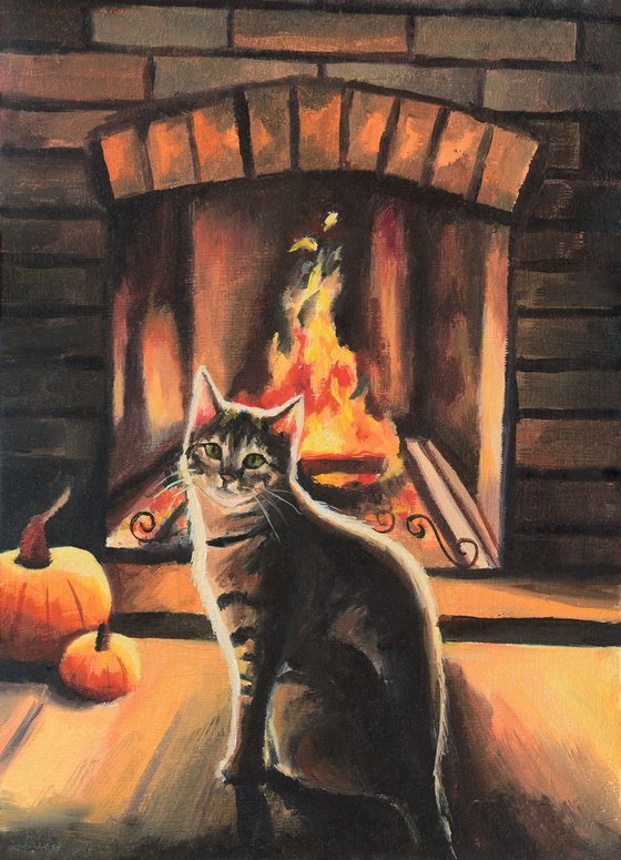 Cat in a cozy autumn fireplace