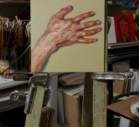 right hand on a green background