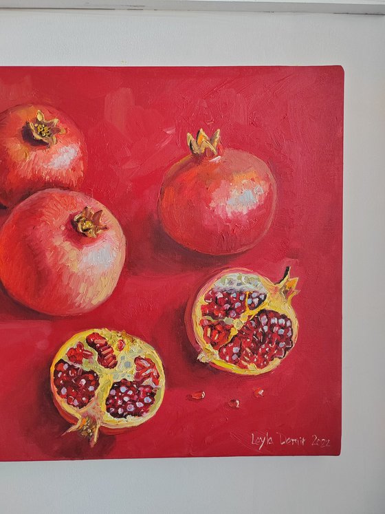 Pomegranate on red