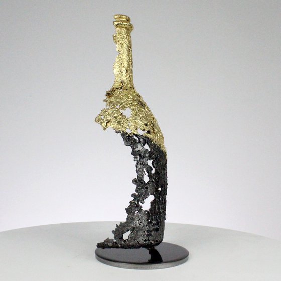 CLXXV bottle - Ruinart champagne bottle sculpture in gold steel