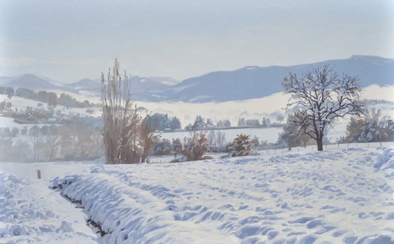 Morning mists on the snowy mountains