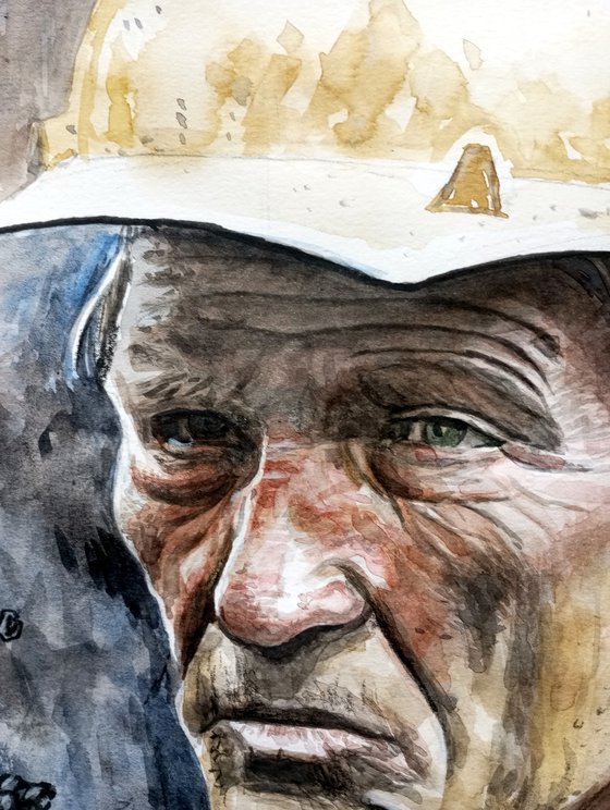 Old miner with dogs