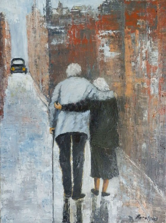 Elderly couple walking