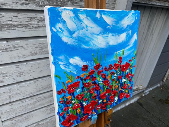 Red poppies at the meadow