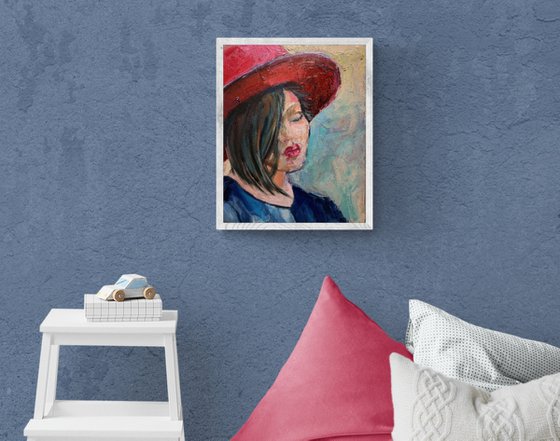 Woman in a red hat.