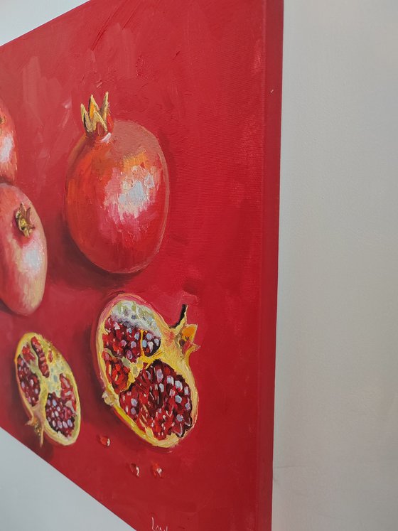 Pomegranate on red