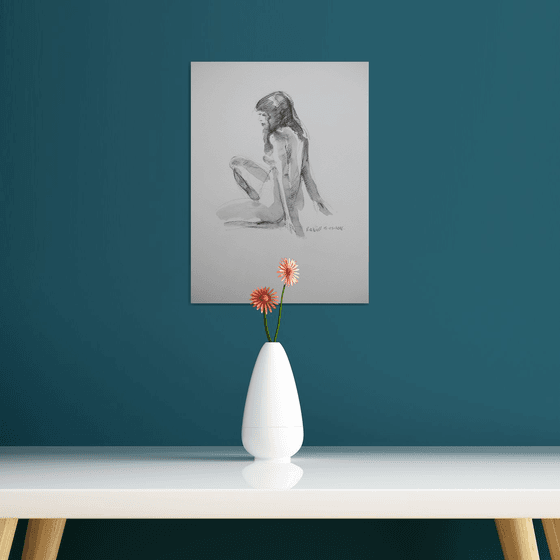 seated female nude