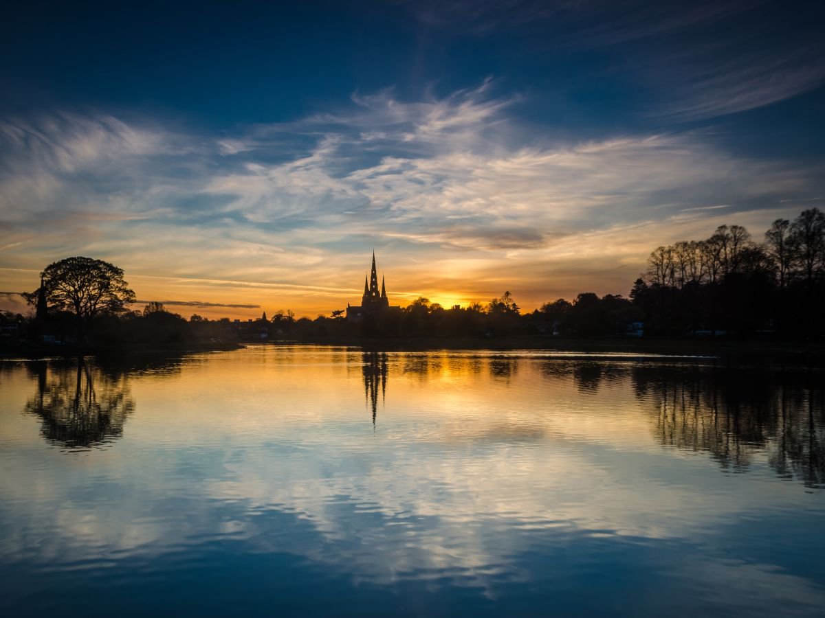 Sunset through the spire II by Michelle Williams Photography
