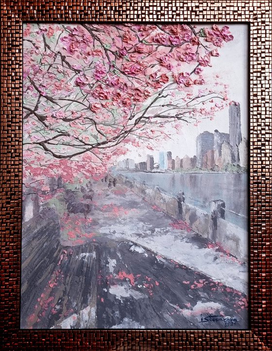 Cherry blossoms. Spring in New York. Roosevelt Island, Manhattan. Pink relief flowers.