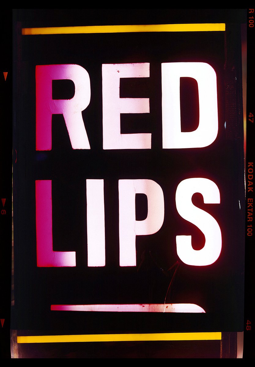 Red Lips, Kowloon, Hong Kong by Richard Heeps