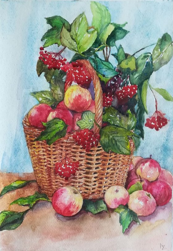 Basket full of apples and berries