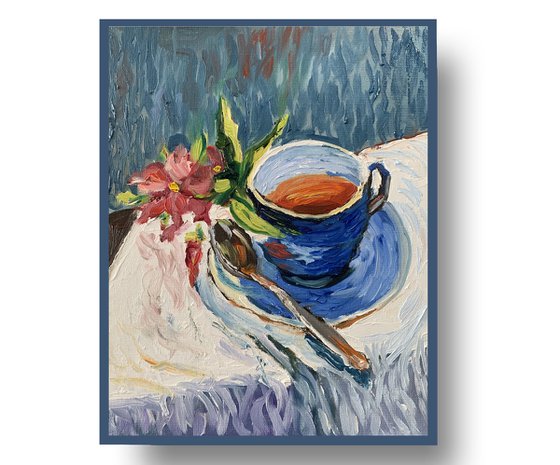 Tea cup with flowers.