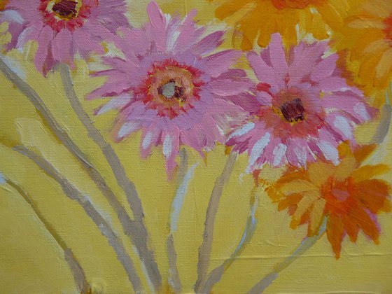 Gerbera flowers in old stone jug