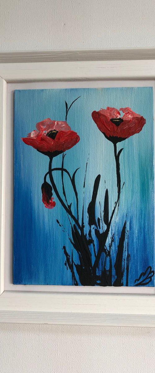 Red Poppies in a frame by Marja Brown