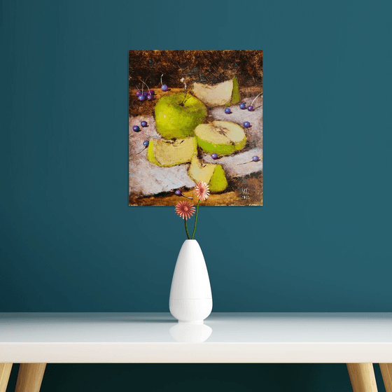 Green apples on dark