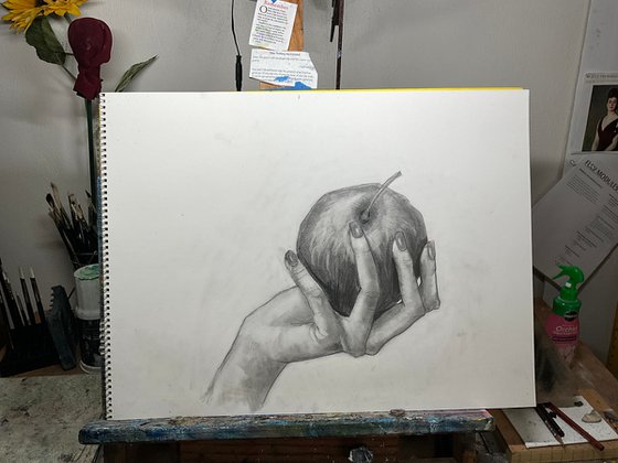 Hand and Apple