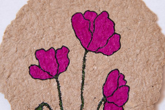 Magenta poppies drawing on the author's craft paper