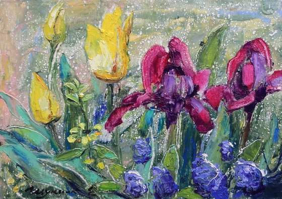 Irises and tulips. Fresh spring rain