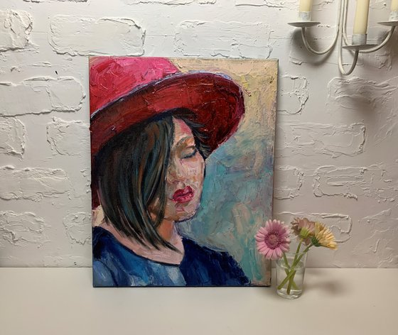 Woman in a red hat.