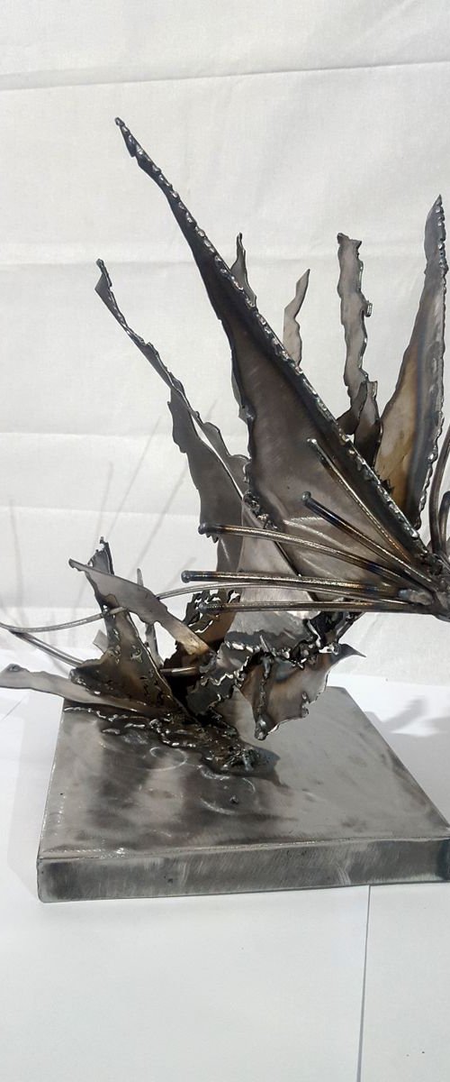 Brutalist welded iron sculpture star bird fueling the space around her  KLOSKA O romanian artist by Kloska Ovidiu
