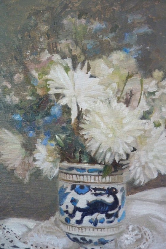 White flowers in a porcelain vase