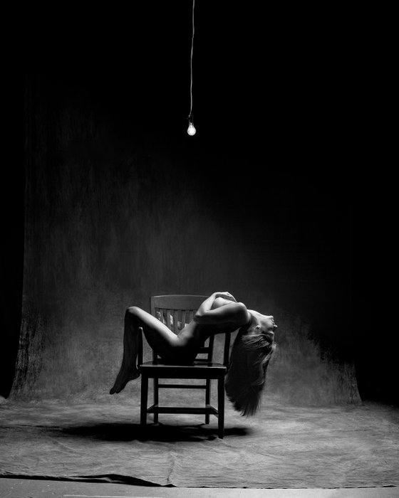 Woman with 60 Watt Bulb
