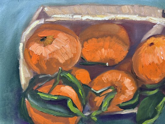 Tangerines in a wooden basket