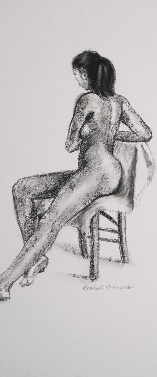 Seated female nude by Rory O’Neill