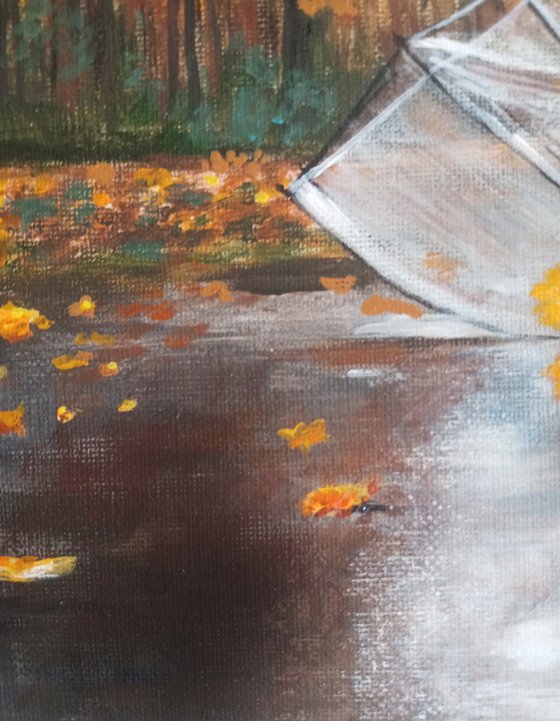 A forgotten umbrella in autumn